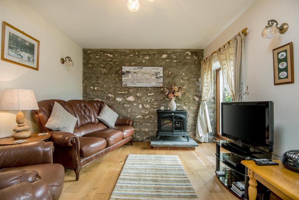 TV a/nebo společenská místnost v ubytování Shepherds Cottage