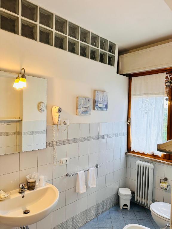 Koupelna v ubytování Cisanello Guest House