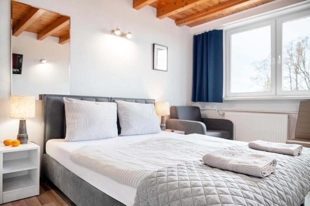 Postel nebo postele na pokoji v ubytování Spa Górka