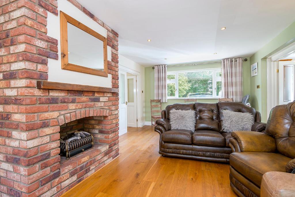 Khu vực ghế ngồi tại 1 Homecroft Bungalows