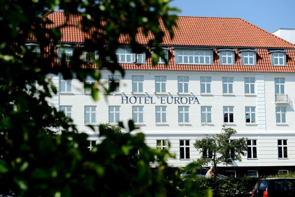 a building with a hotel burora on it at Hotel Europa in Aabenraa