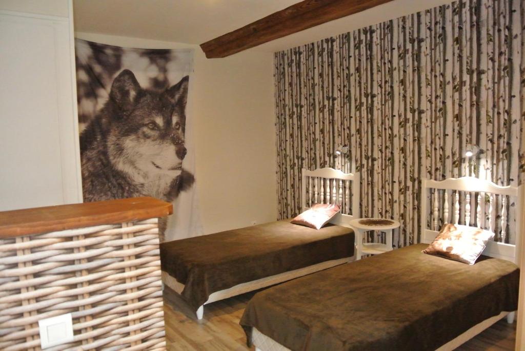 Postel nebo postele na pokoji v ubytování La Fresnée chambres d'hôtes