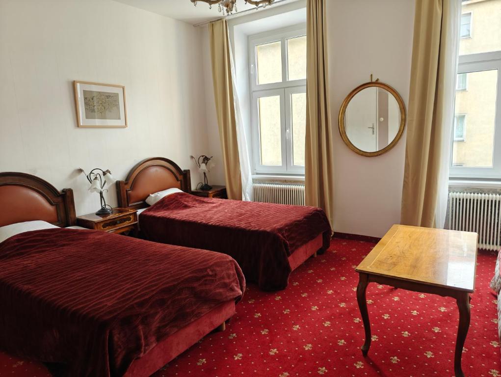 Postel nebo postele na pokoji v ubytování Hotel Viki