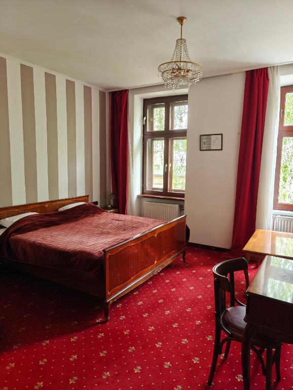 Postel nebo postele na pokoji v ubytování Hotel Viki