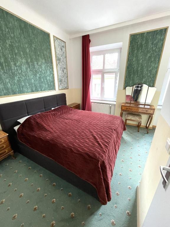 Postel nebo postele na pokoji v ubytování Hotel Viki