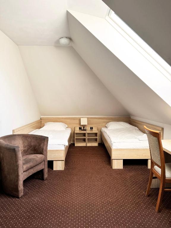 Postel nebo postele na pokoji v ubytování Motel DB2000