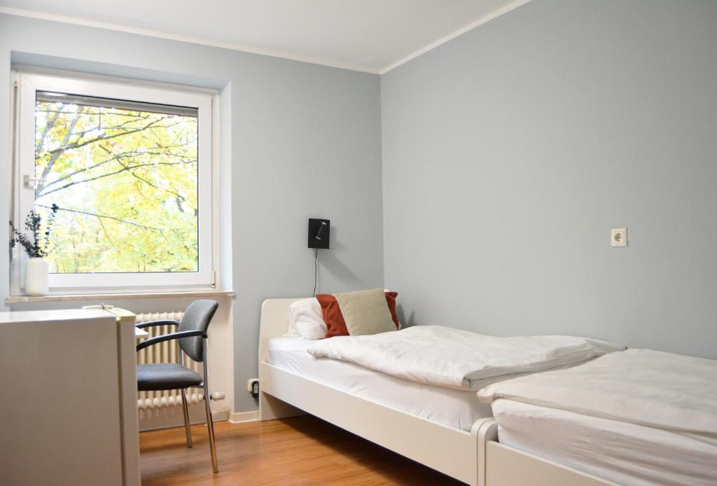 Postel nebo postele na pokoji v ubytování 1, 2, sleep Hostel Nürnberg Messe