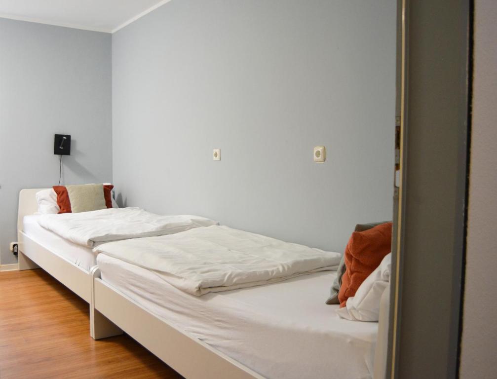 Postel nebo postele na pokoji v ubytování 1, 2, sleep Hostel Nürnberg Messe