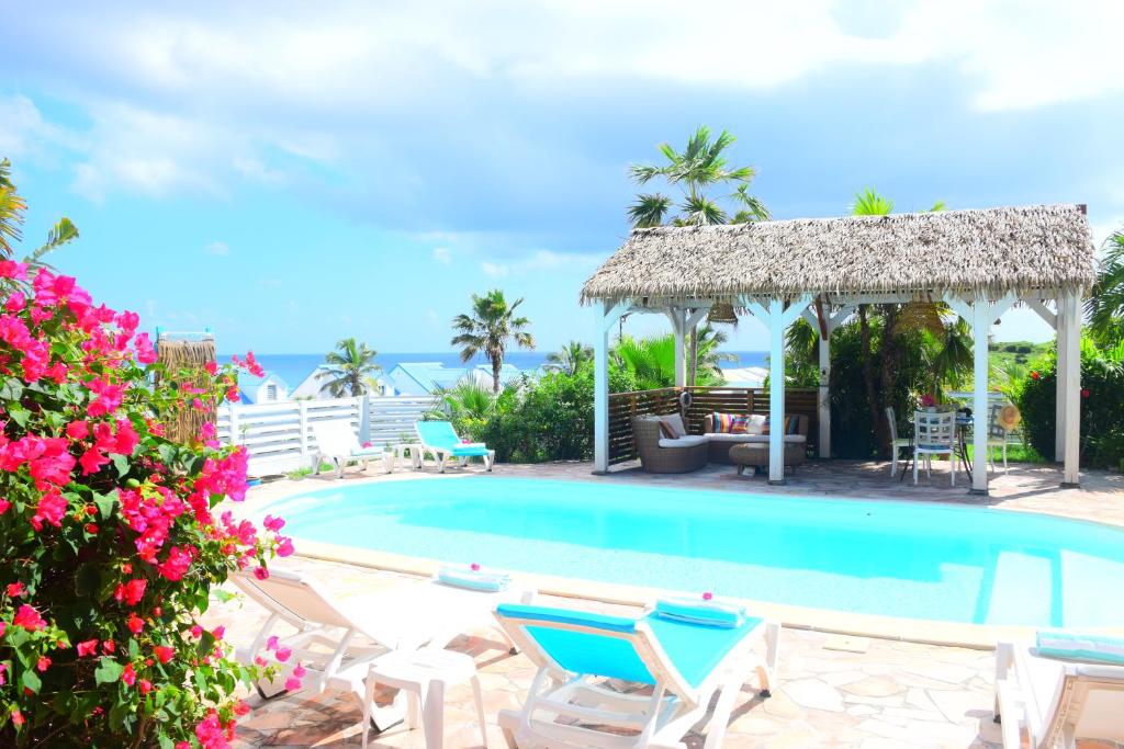 Bazén v ubytování TIKO LODGE SXM nebo v jeho okolí