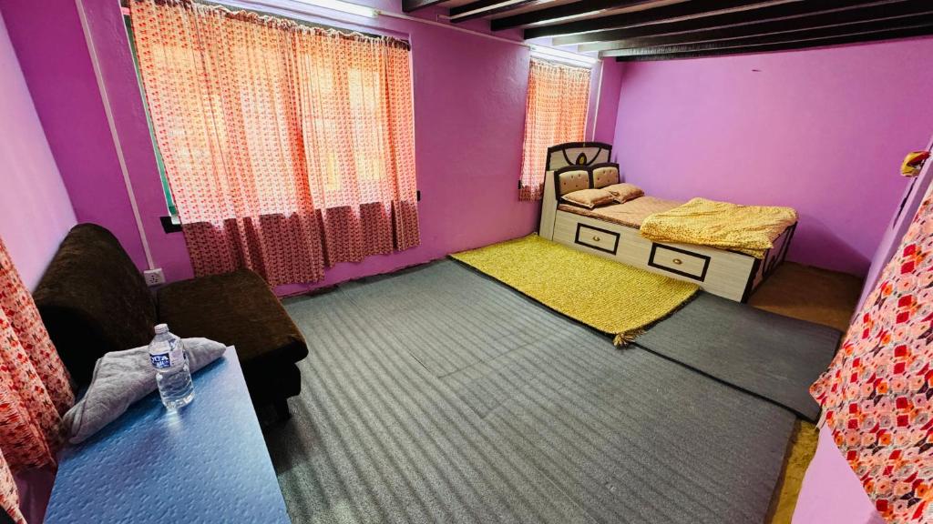 Postel nebo postele na pokoji v ubytování Maa Buu Chhen