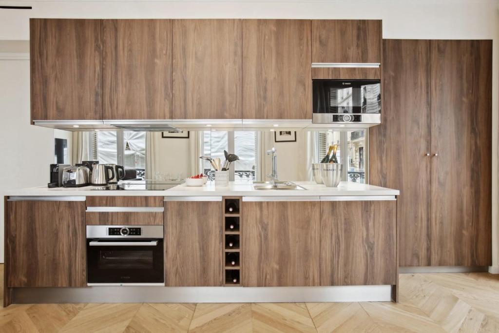 Kuchyňa alebo kuchynka v ubytovaní 268 Suite Ville - Superb apartment in Paris
