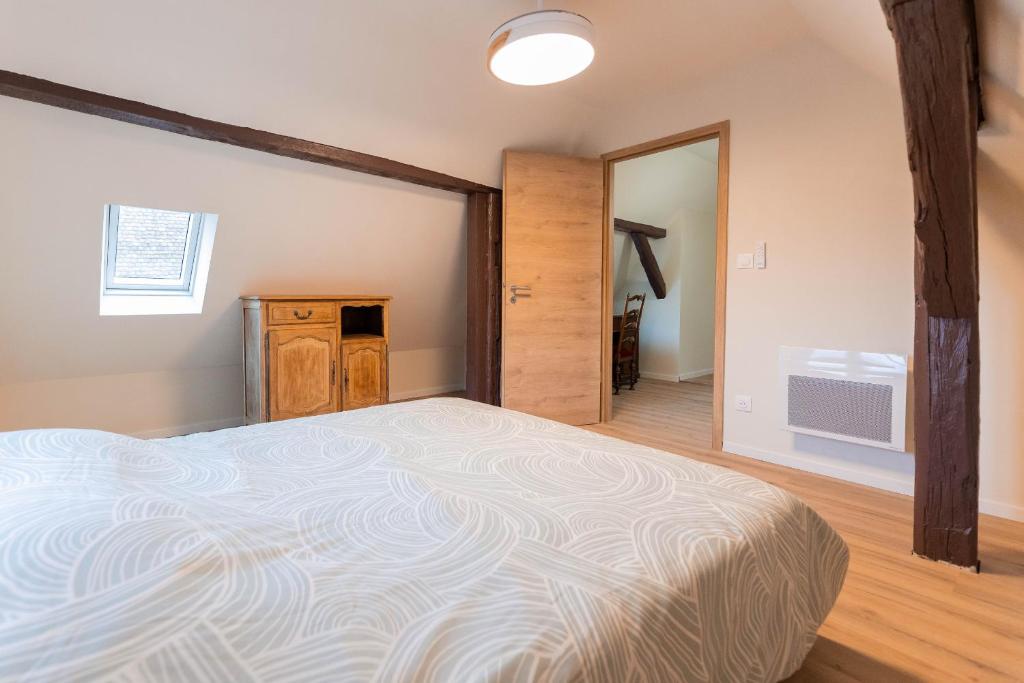Postel nebo postele na pokoji v ubytování Zellenberg - Gîte d'Aksel
