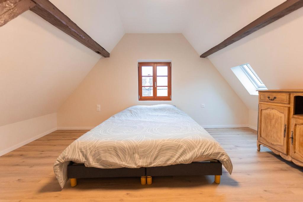 Postel nebo postele na pokoji v ubytování Zellenberg - Gîte d'Aksel