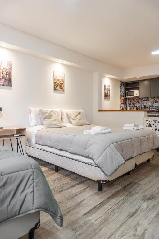 Postel nebo postele na pokoji v ubytování Departamento 3 Paris - Edificio VILAUT by INMOVE Temporarios