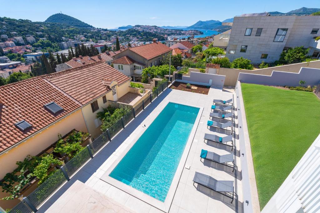 an aerial view of a house with a swimming pool at Villa Sunset Dubrovnik in Dubrovnik