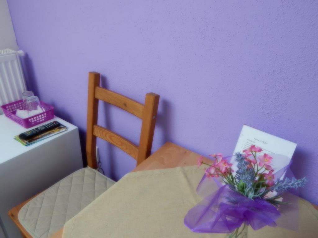 Postel nebo postele na pokoji v ubytování Penzion V Hájku
