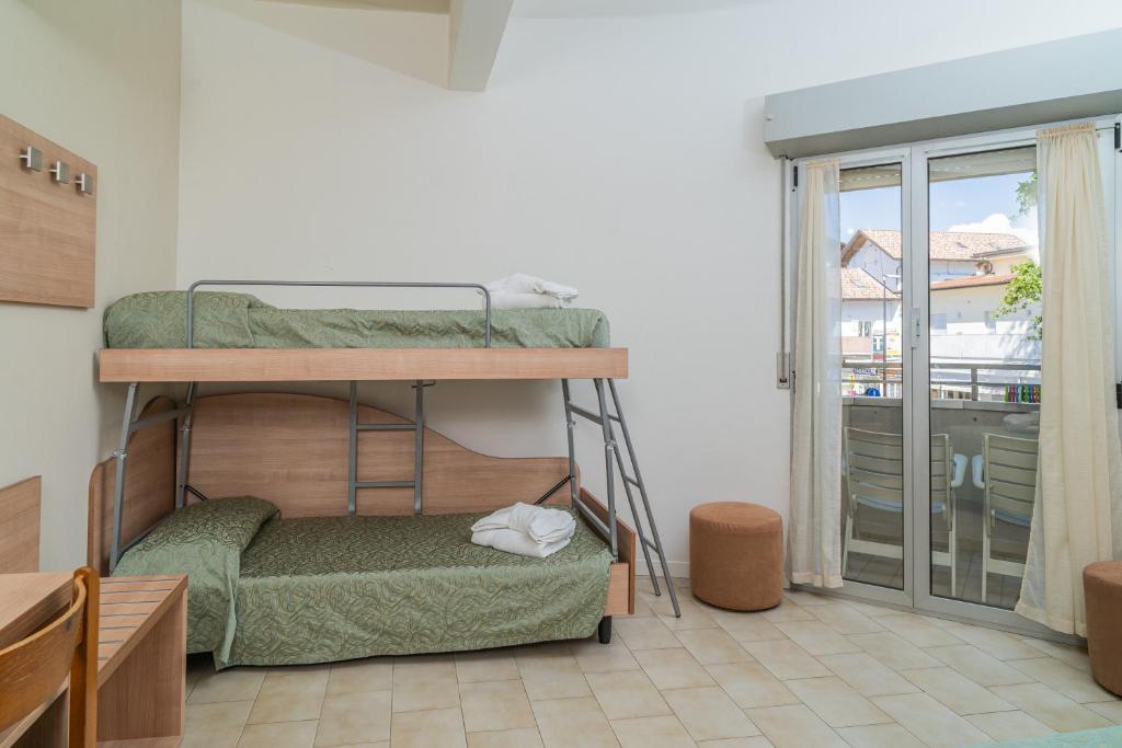Postel nebo postele na pokoji v ubytování Hotel Ondina e Milazzo