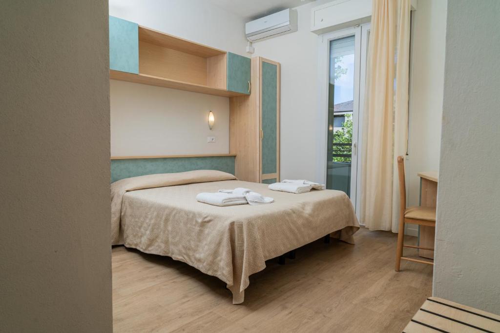 Postel nebo postele na pokoji v ubytování Hotel Ondina e Milazzo