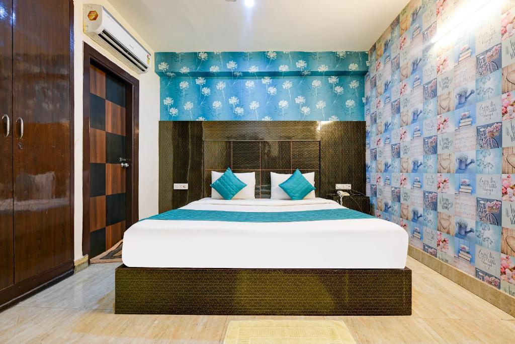 Postel nebo postele na pokoji v ubytování Hotel Ark Suites At Airport