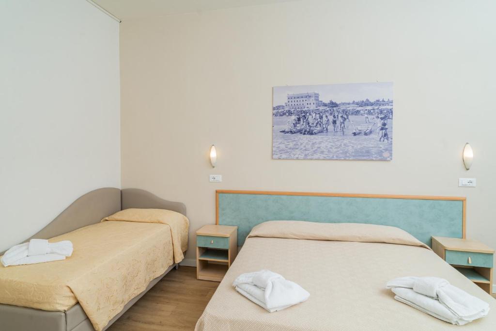 Postel nebo postele na pokoji v ubytování Hotel Ondina e Milazzo