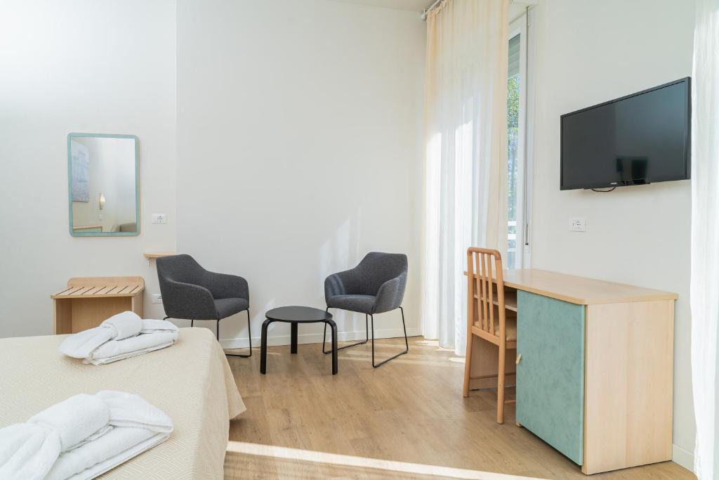 TV a/nebo společenská místnost v ubytování Hotel Ondina e Milazzo