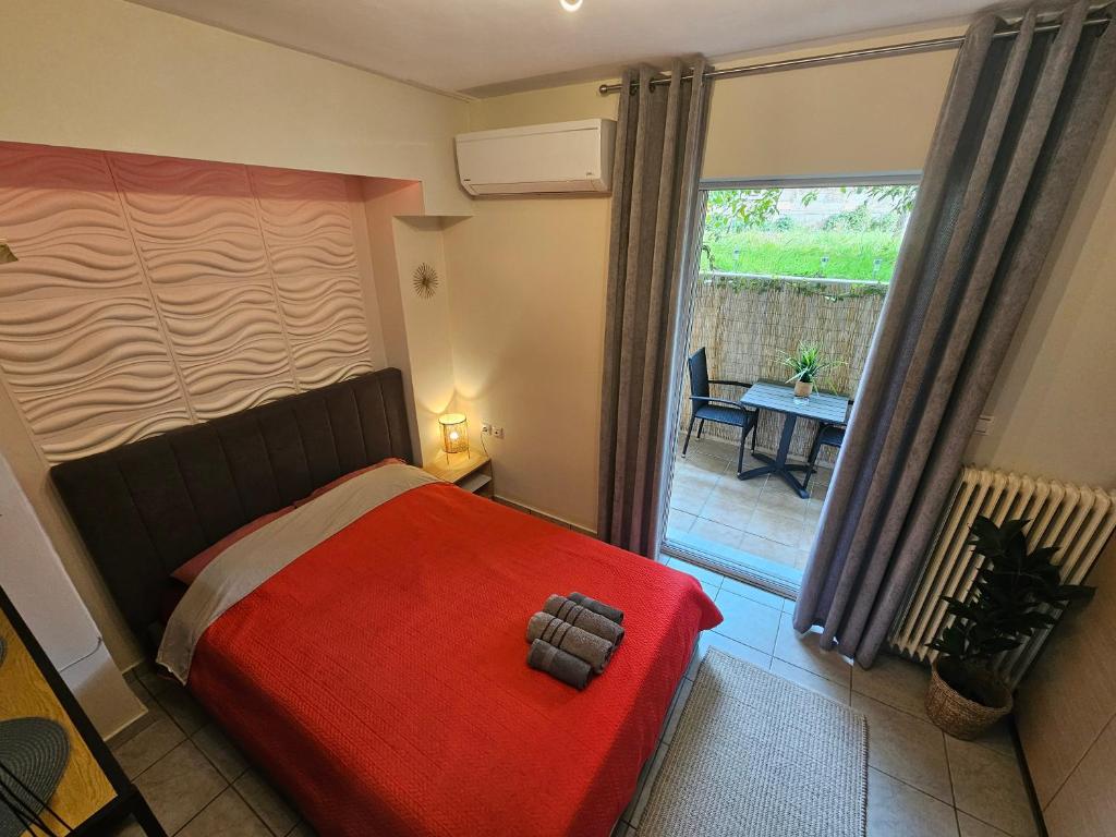 Postel nebo postele na pokoji v ubytování Stylish studio - Your private place in Lamia