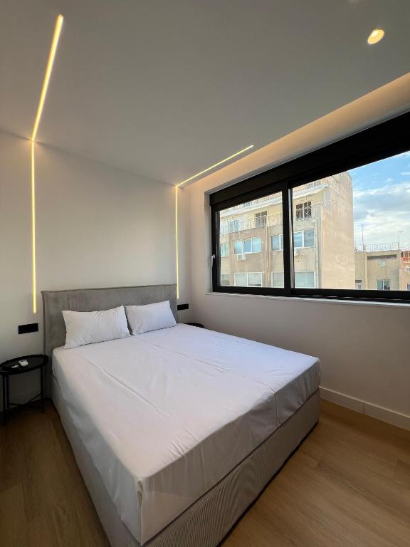 Postel nebo postele na pokoji v ubytování BlueMotion - CruiseNest Complex