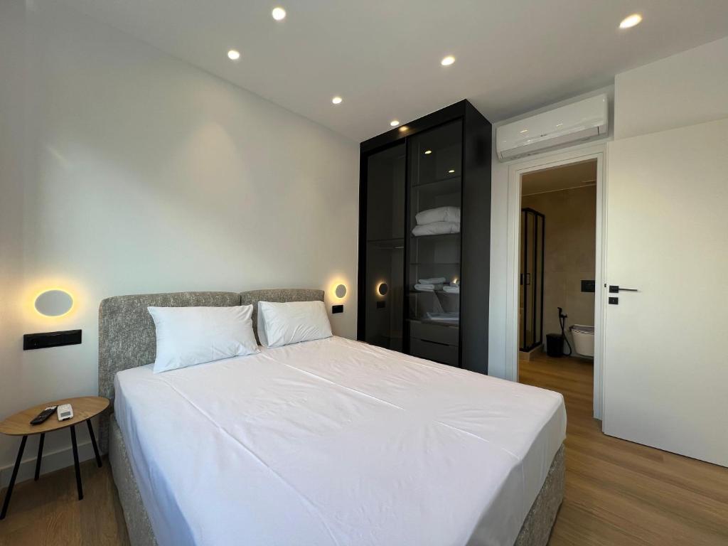 Postel nebo postele na pokoji v ubytování BlueMotion - CruiseNest Complex