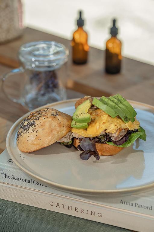 a sandwich on a plate on a table at The Charlee Hotel in Medellín