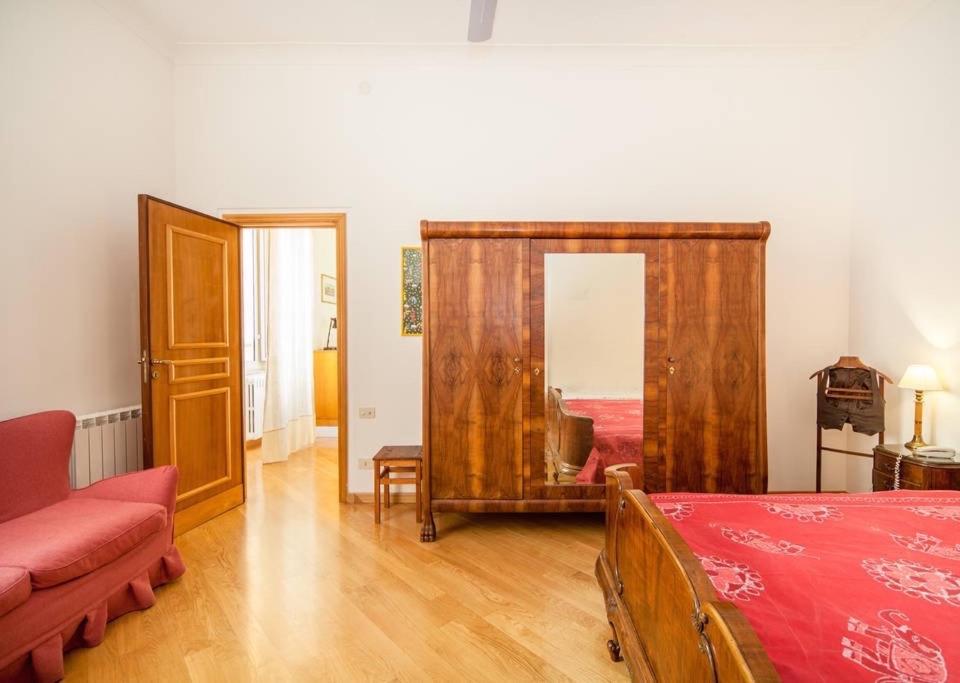 Łóżko lub łóżka w pokoju w obiekcie Chiaia B&B