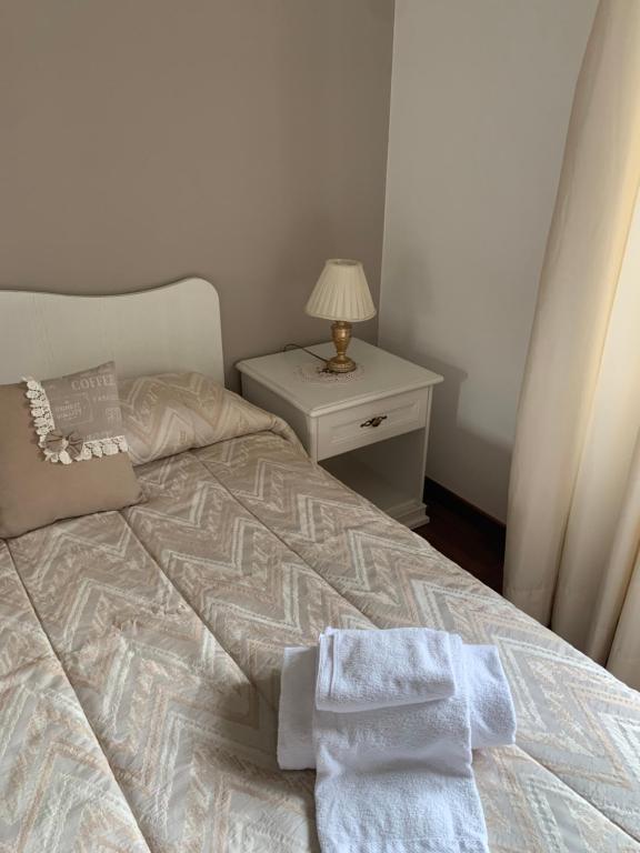 Postel nebo postele na pokoji v ubytování Villa Orsini