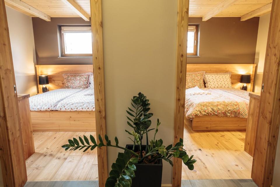 Postel nebo postele na pokoji v ubytování Apartments Krvavec