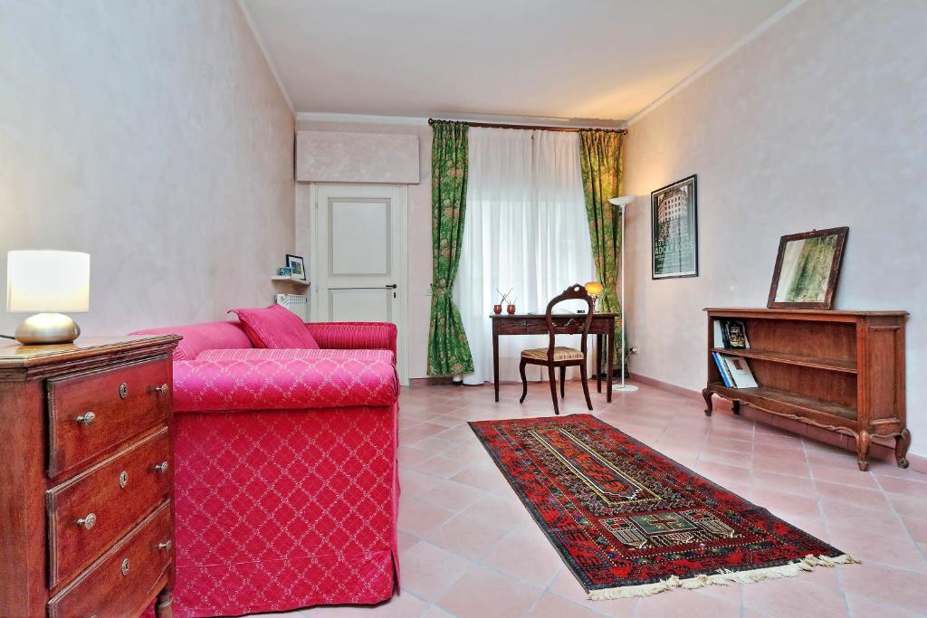 Posteľ alebo postele v izbe v ubytovaní Charmsuite Palladio