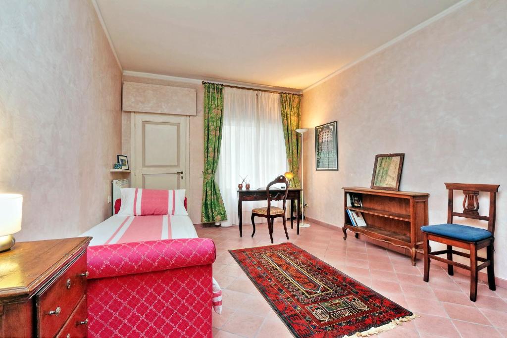Posteľ alebo postele v izbe v ubytovaní Charmsuite Palladio