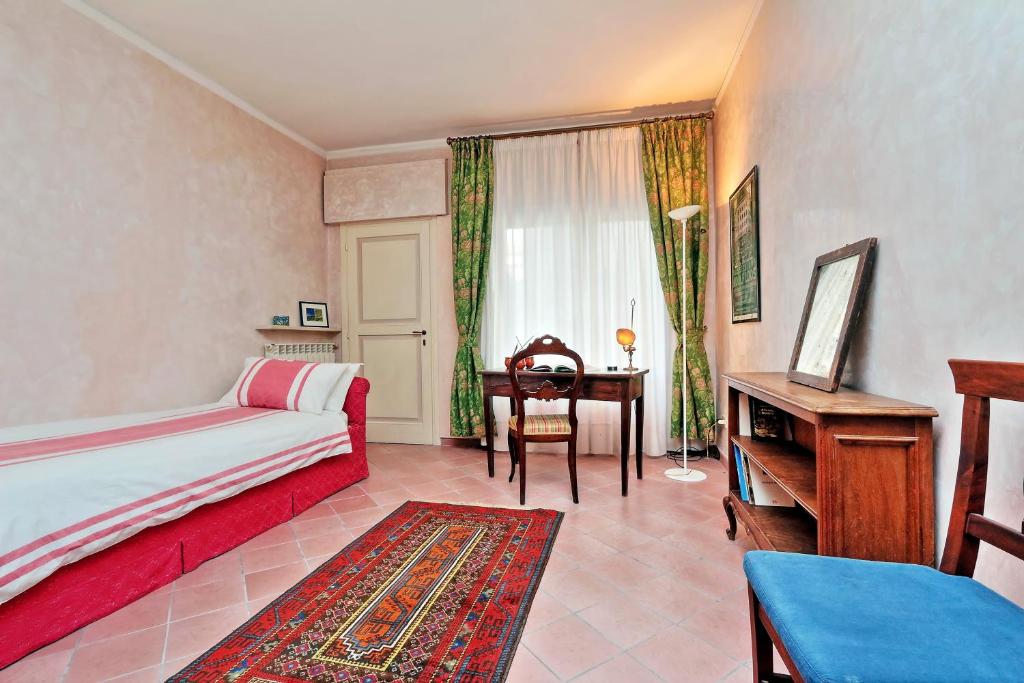 Posteľ alebo postele v izbe v ubytovaní Charmsuite Palladio