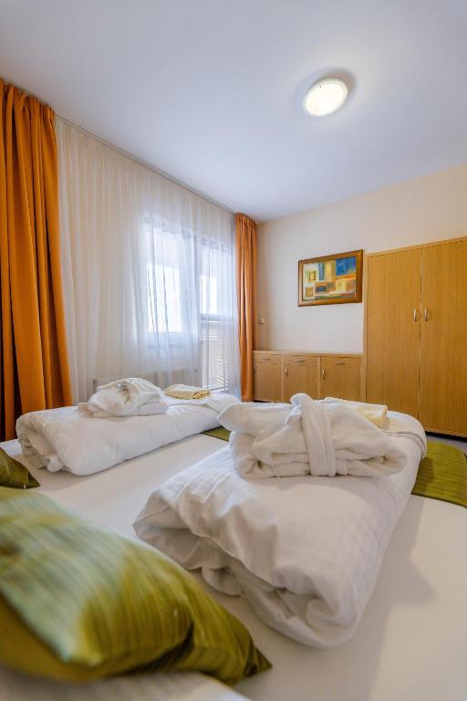 Postel nebo postele na pokoji v ubytování Hotel Bystrina