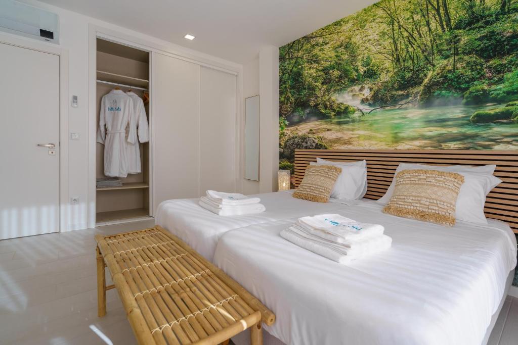Ein Bett oder Betten in einem Zimmer der Unterkunft Villa Lola