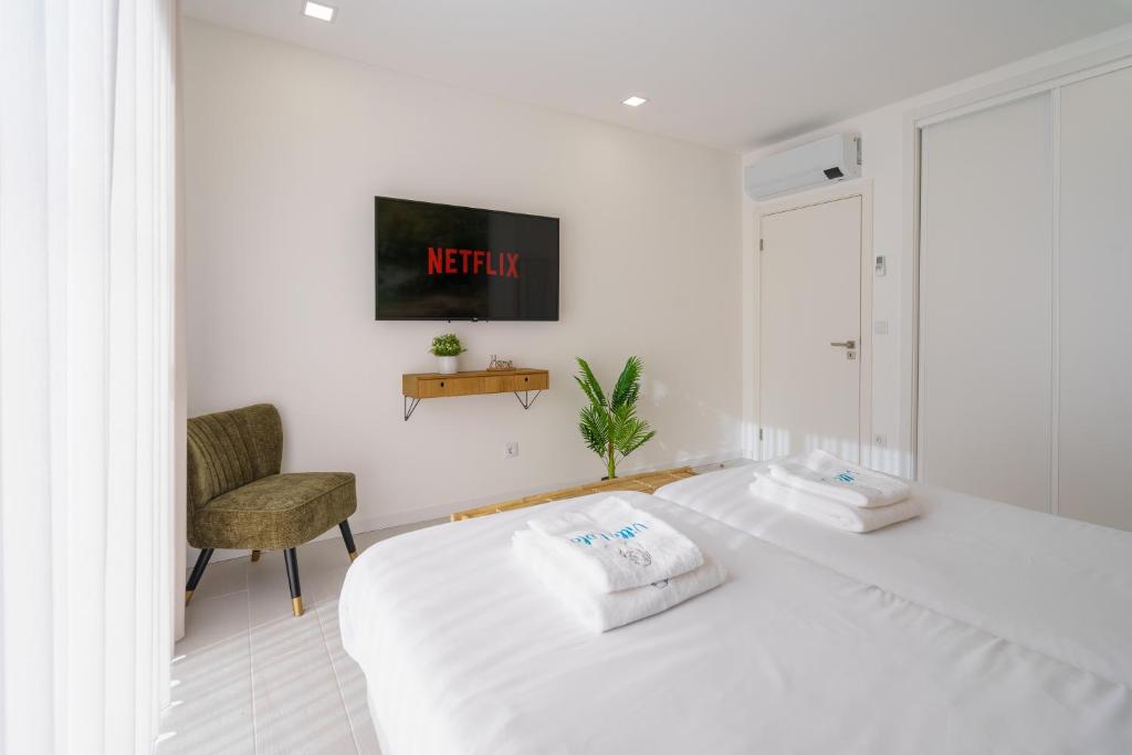 Ein Bett oder Betten in einem Zimmer der Unterkunft Villa Lola