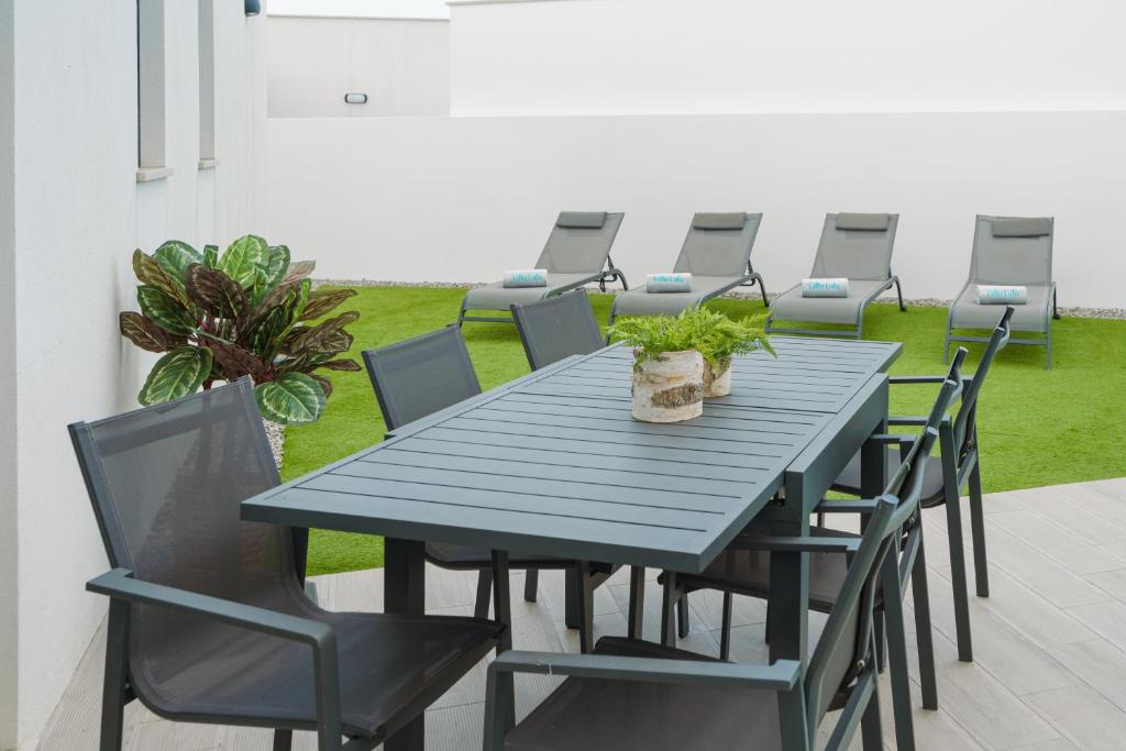 Ein Sitzbereich in der Unterkunft Villa Lola