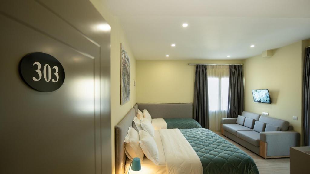 Postel nebo postele na pokoji v ubytování F&M Hotel 2