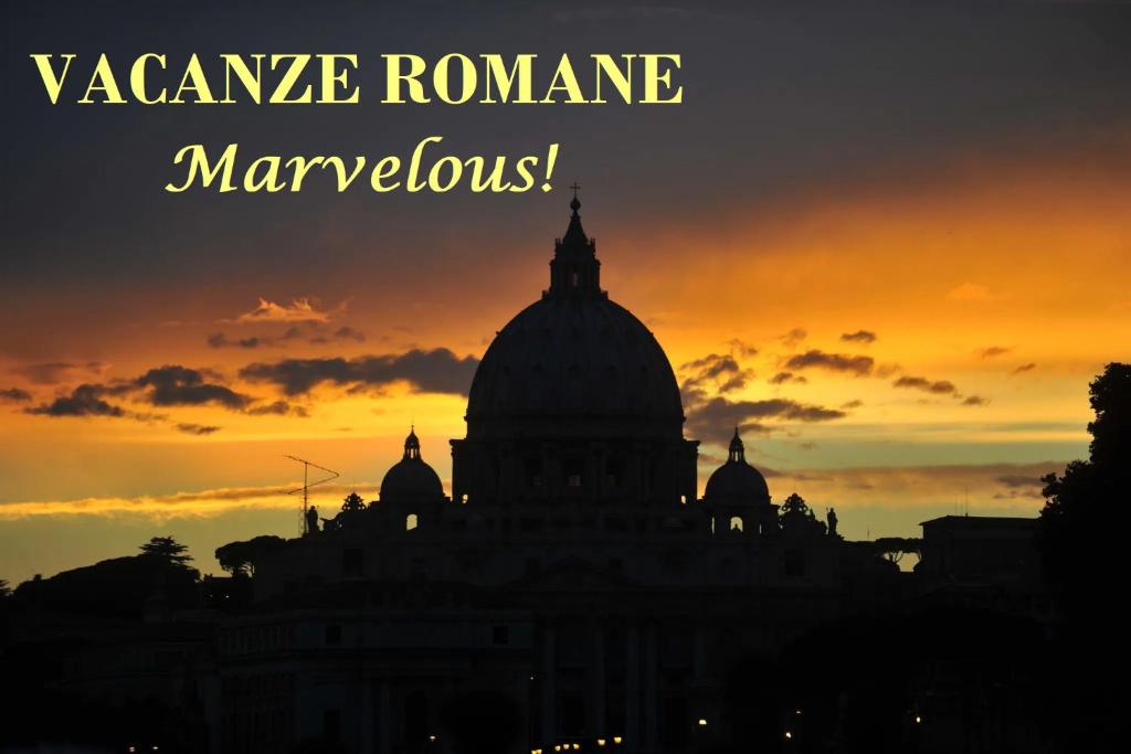 a silhouette of a building with a sunset in the background at Vacanze Romane in Rome