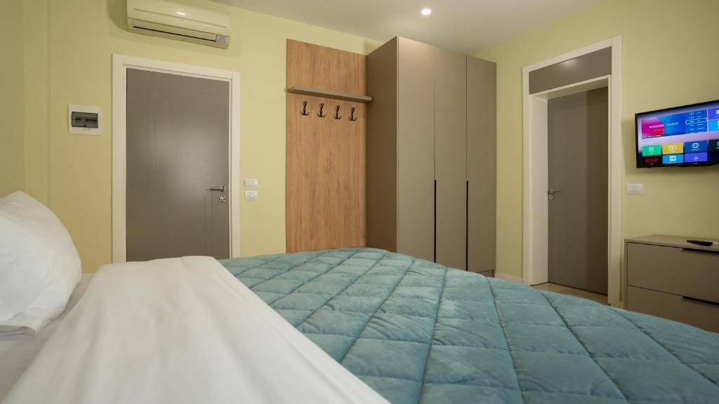 Postel nebo postele na pokoji v ubytování F&M Hotel 2