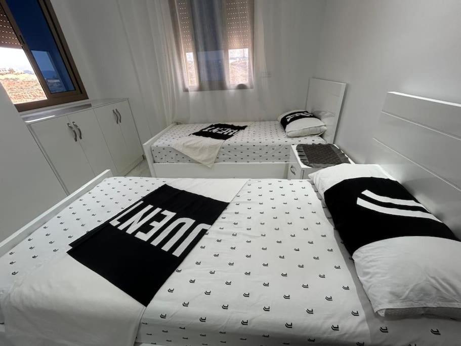 Postel nebo postele na pokoji v ubytování Apartment in Al Hoceima