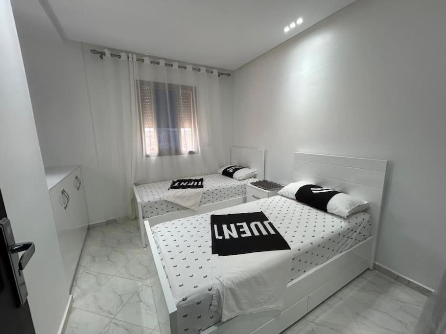 Postel nebo postele na pokoji v ubytování Apartment in Al Hoceima
