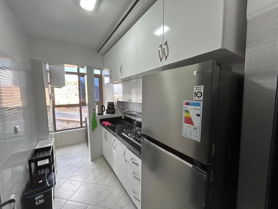 Kuchyň nebo kuchyňský kout v ubytování Apartment in Al Hoceima