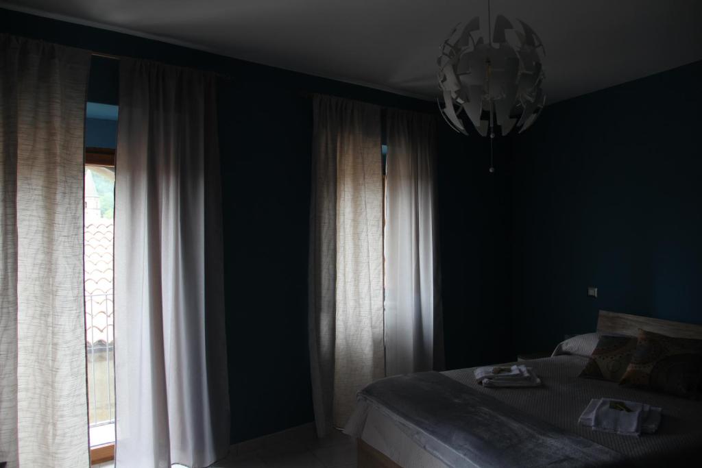 Postel nebo postele na pokoji v ubytování Casa Vacanze Sud e Magia