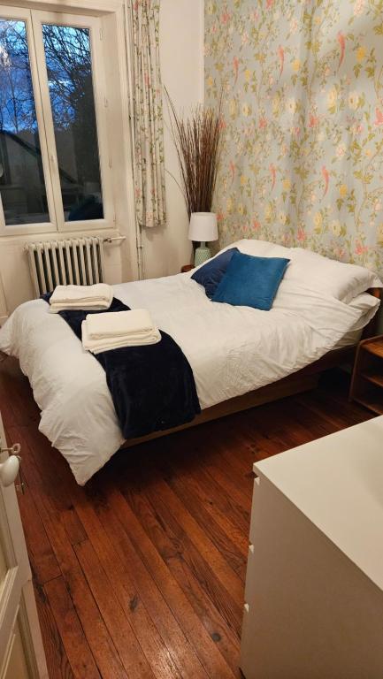 Postel nebo postele na pokoji v ubytování The Lions Den - La Loge Guest House