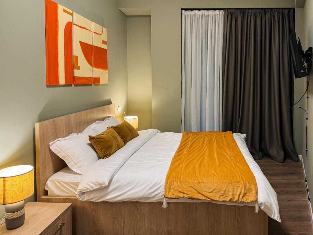 Postel nebo postele na pokoji v ubytování New Gudauri Apartment NEO 223