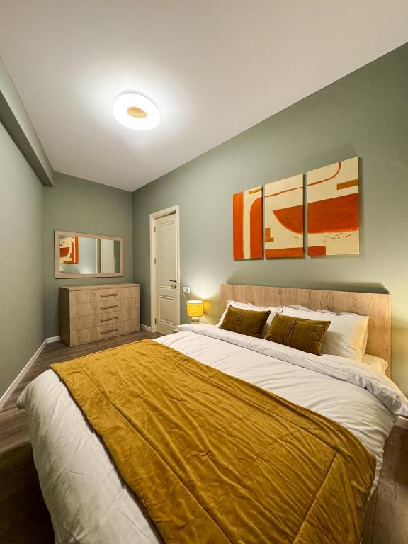 Postel nebo postele na pokoji v ubytování New Gudauri Apartment NEO 223
