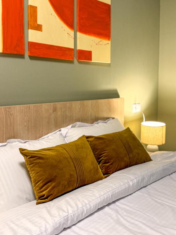 Postel nebo postele na pokoji v ubytování New Gudauri Apartment NEO 223